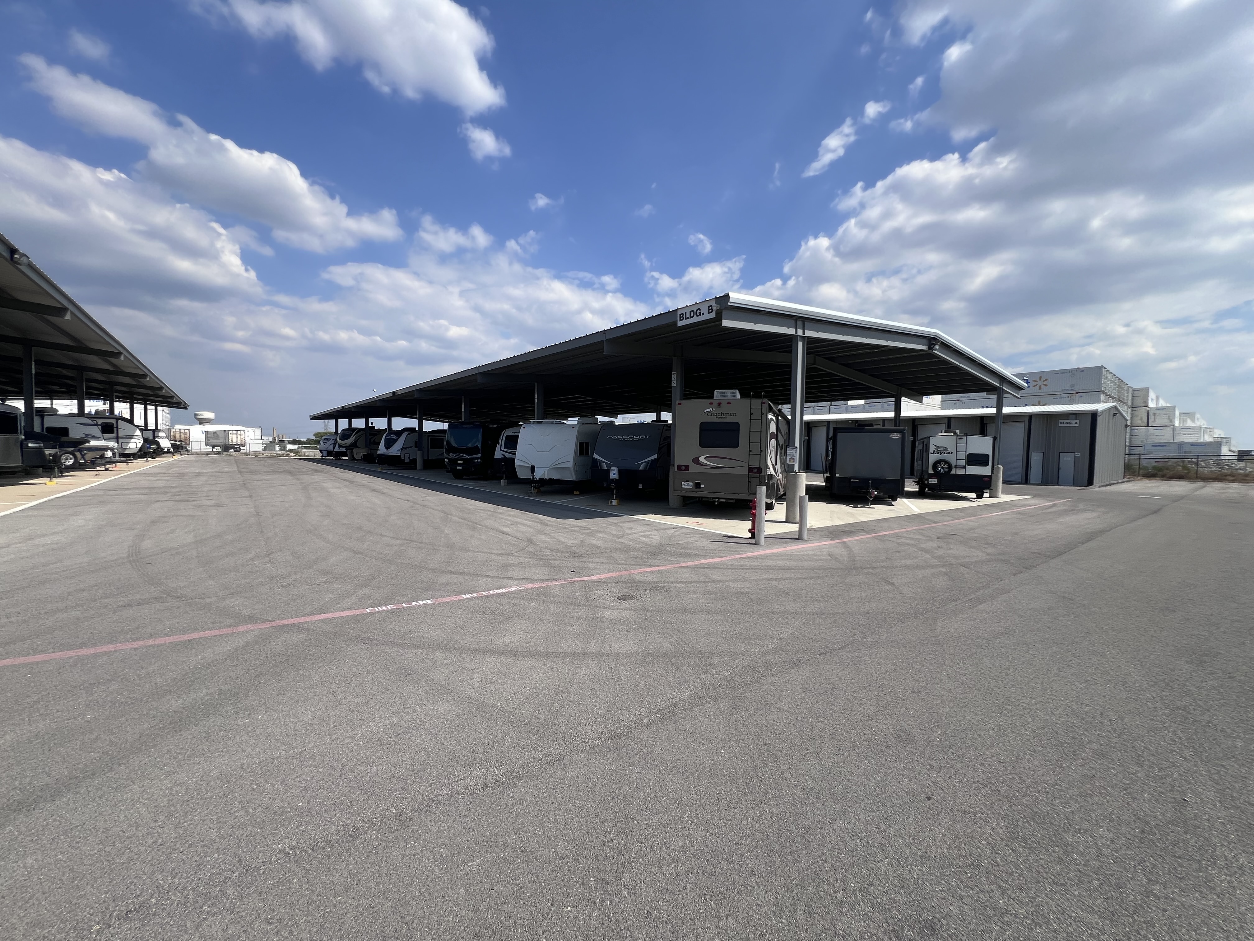 Canopy parking spaces with electricity for trickle charging at Haslet Boat and RV Storage